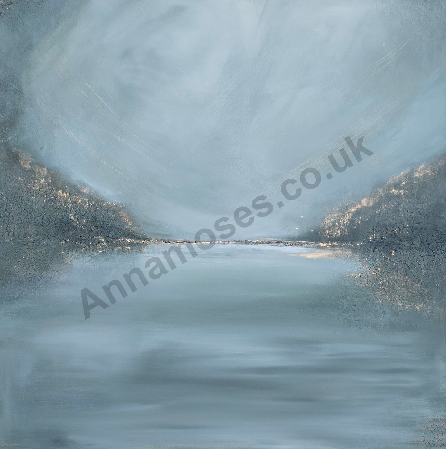 Frosted glass window with a blurred view of water and mountains