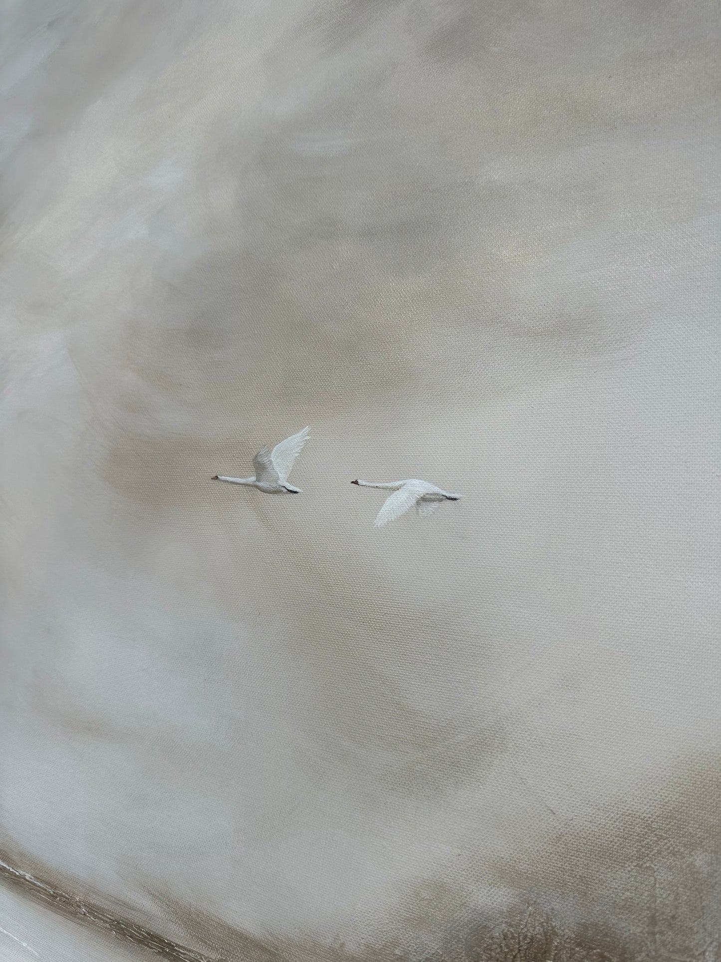 Painting with swans flying in white and gold cream colour