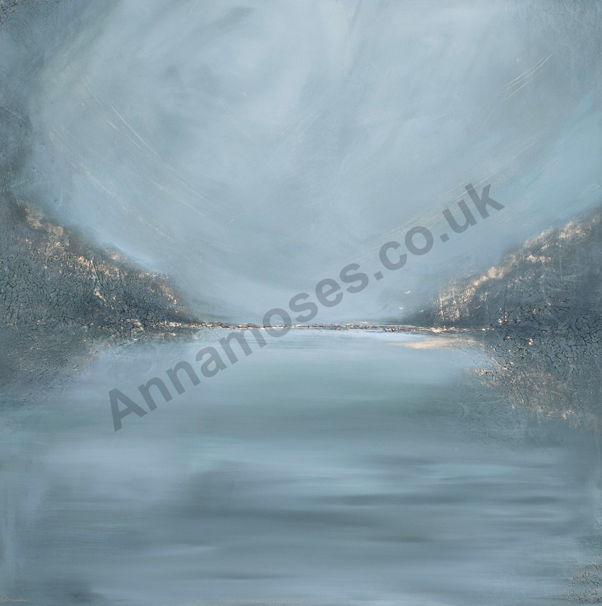 Frosted glass window with a blurred view of water and mountains