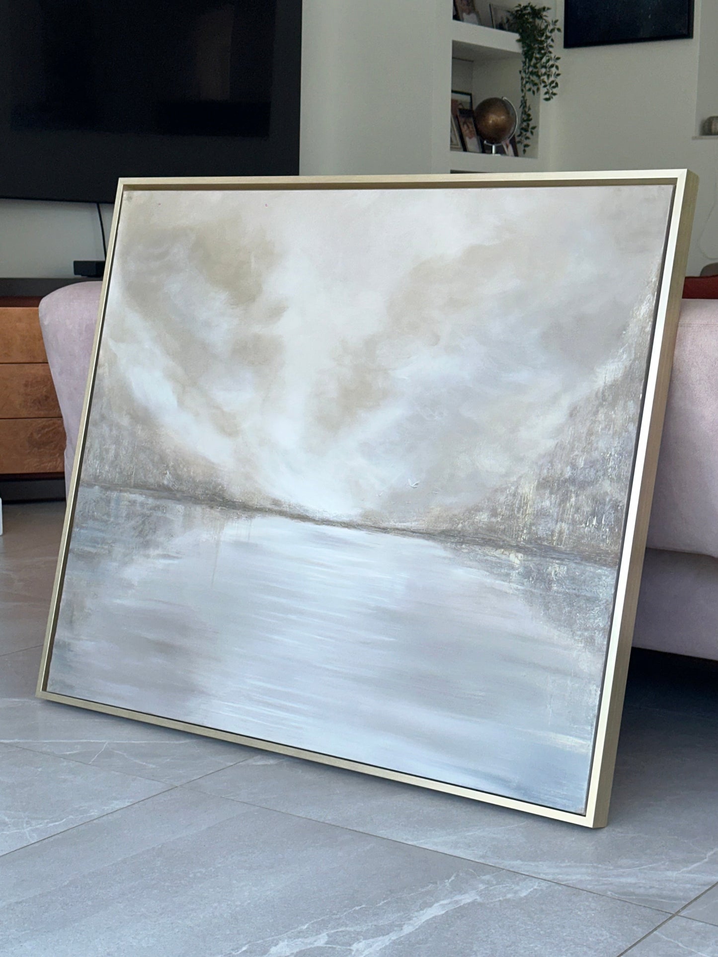 Minimalist abstract lake painting in neutral grey tones with soft reflections